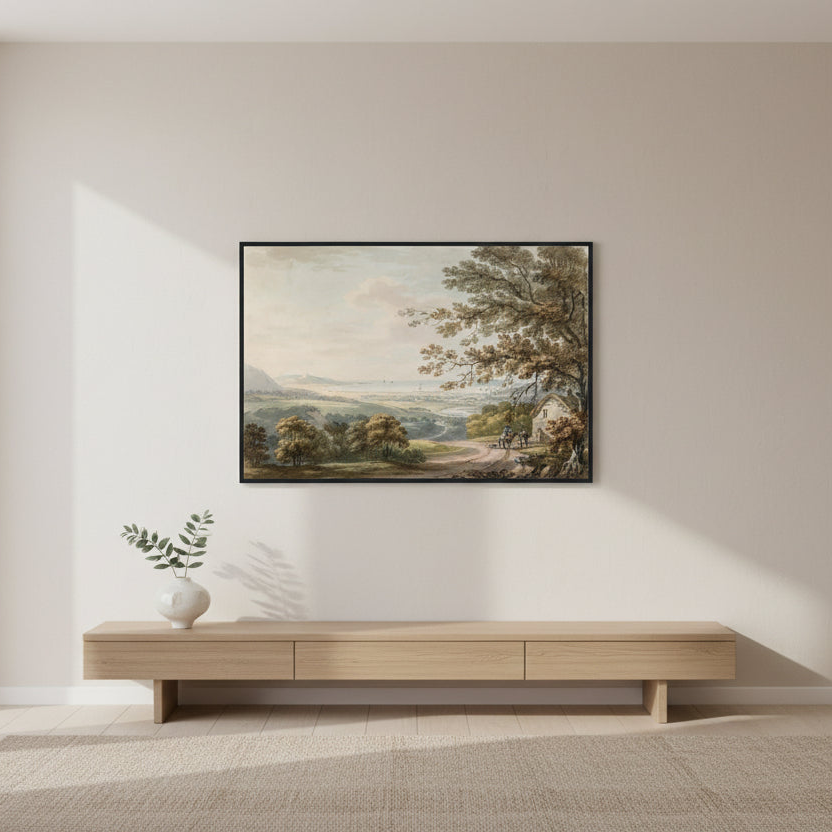 Framed landscape painting on a wall above a wooden console table.