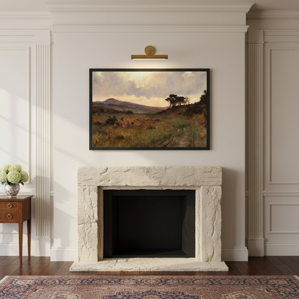 Framed landscape print of A View of Castletownshend centered above a limestone mantle in a Georgian townhouse; neutral plaster walls, brass picture light, black frame, afternoon window light.