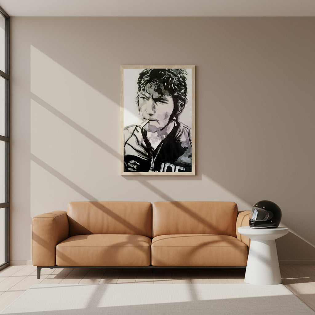 Joey Dunlop framed art print in a minimalist living room, above a leather sofa, neutral walls, soft natural lighting, motorcycle helmet on side table.