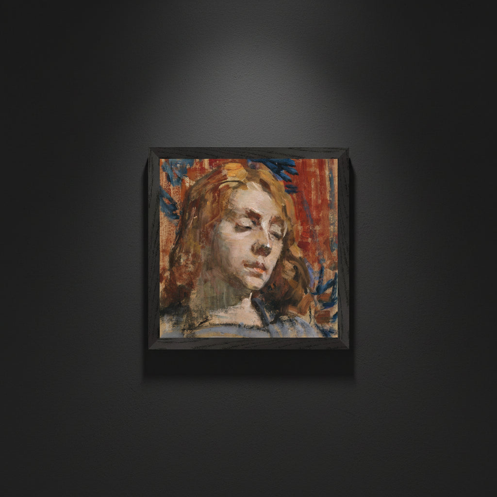 Black wooden frame on a dimly lit Irish museum wall, deep charcoal background.